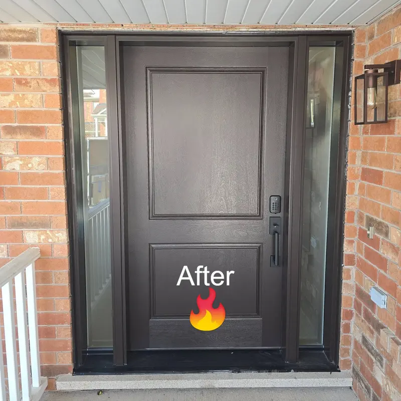 After: the double doors replaced with one wide dark fiberglass entry door with glass sidelites