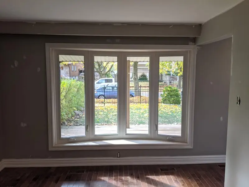 Inside view of a newly installed vinyl bay-style window